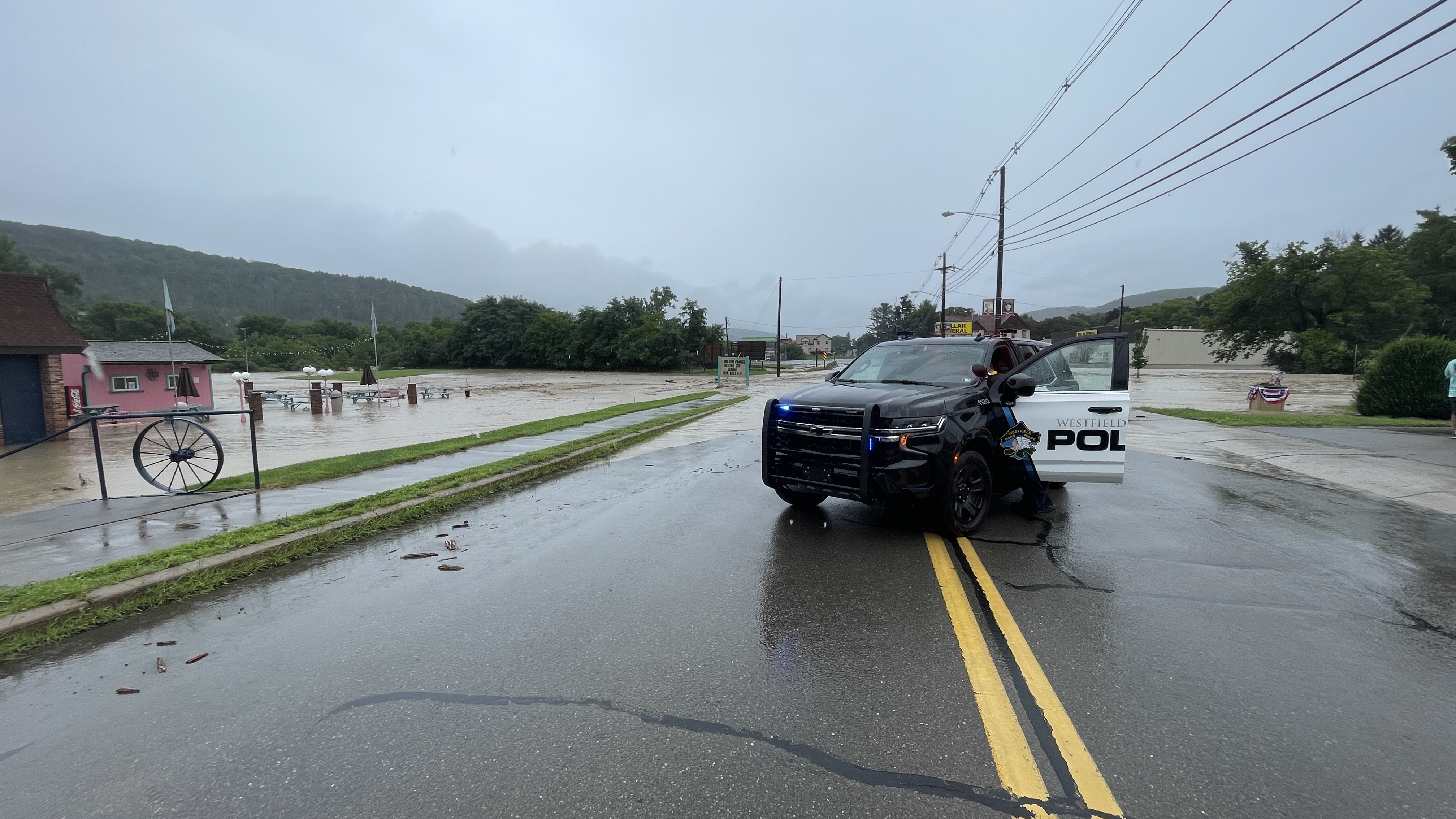 Arriving at the first call on foot due to road blockage and being unable to get to the fire station.